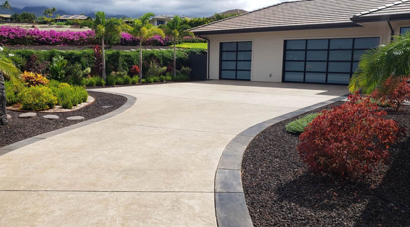 Premium decorative concrete driveway with border in Compton, CA